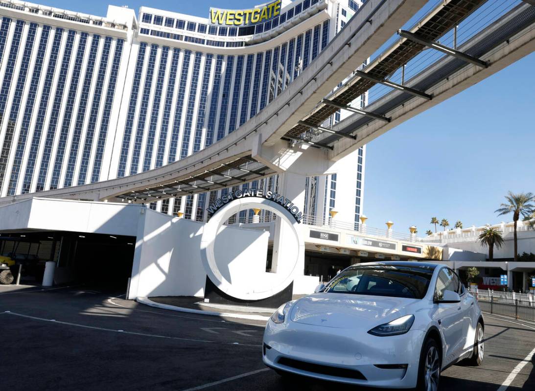 A Tesla with passengers leaves the Westgate's Vegas Loop station, an underground transportation ...