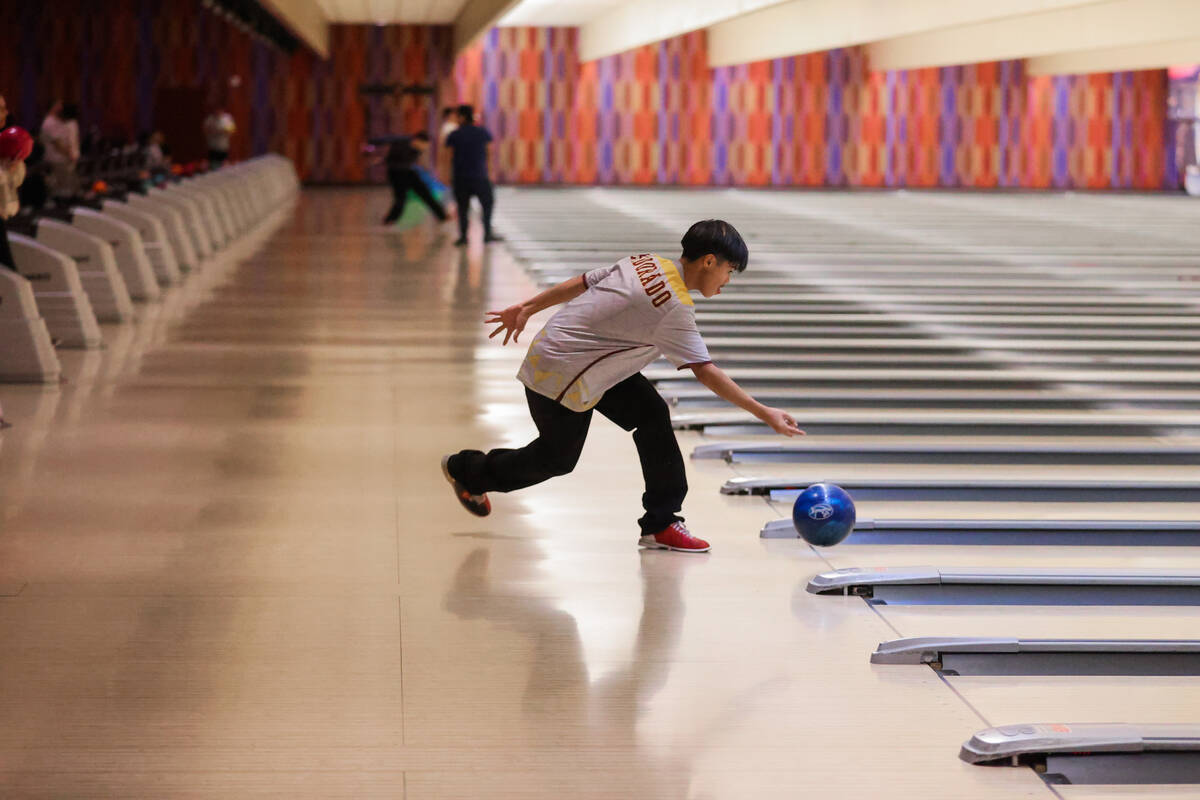 Students bowl during a high school bowling match between Coral Academy and Eldorado at The Orle ...