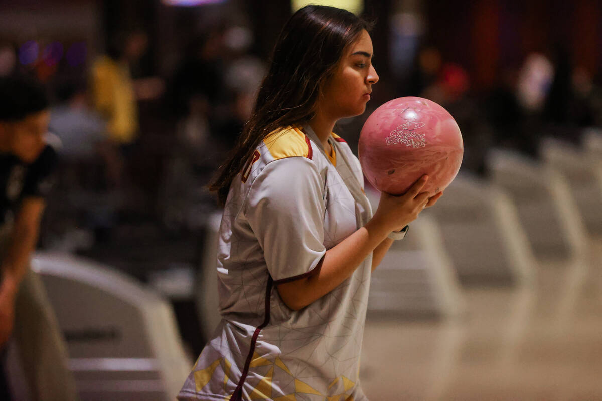 Students bowl during a high school bowling match between Coral Academy and Eldorado at The Orle ...