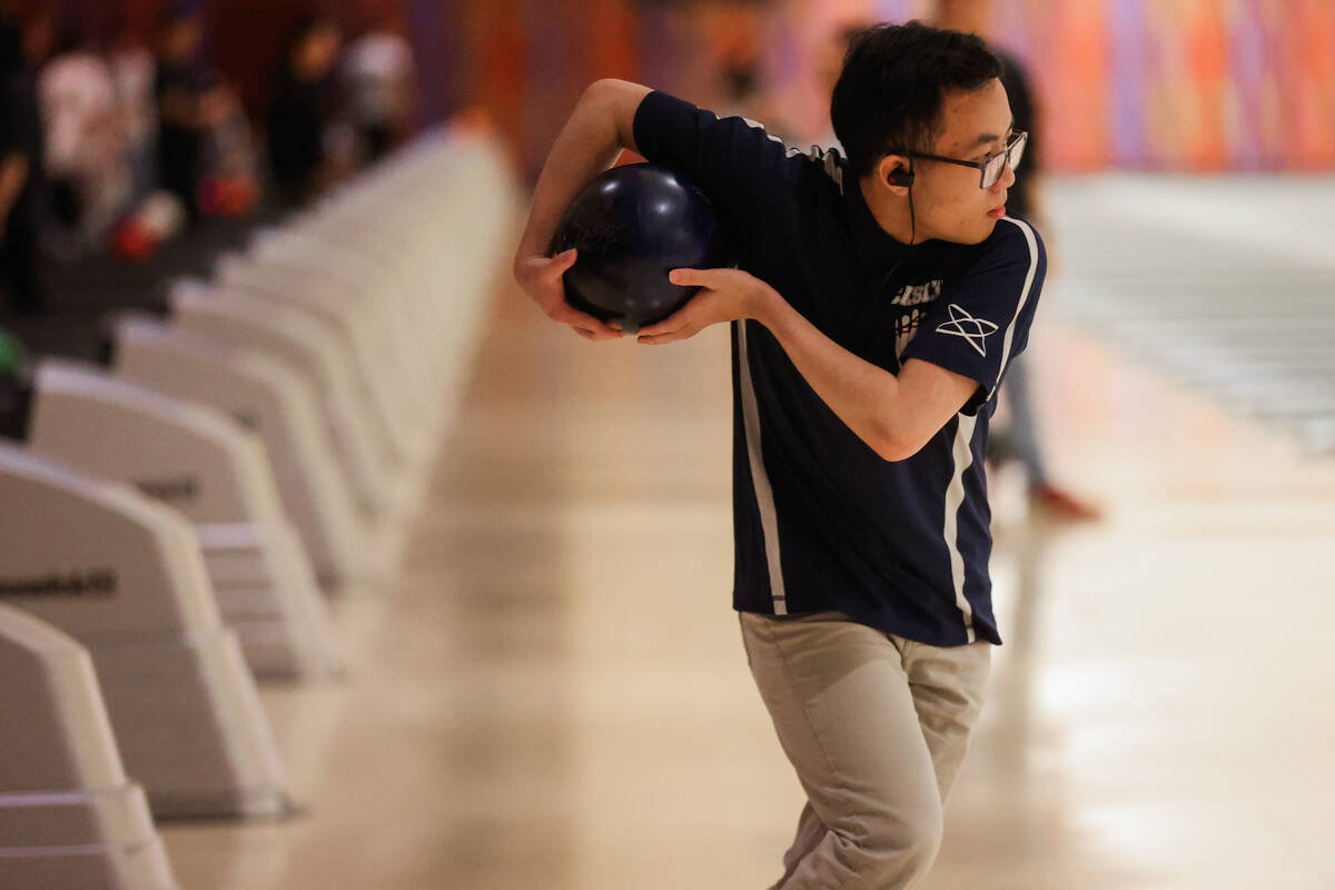 Ryan Le of Coral Academy swings the ball during a high school bowling match between Coral Acade ...
