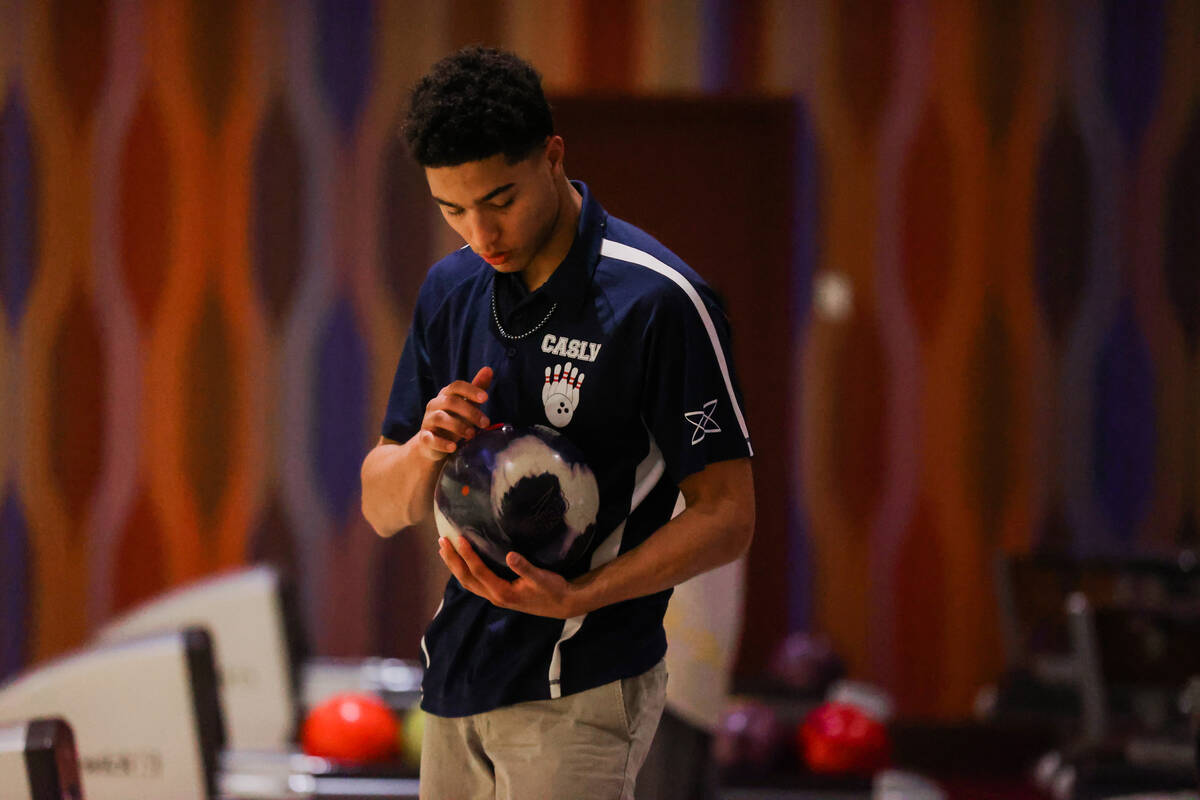 Students bowl during a high school bowling match between Coral Academy and Eldorado at The Orle ...