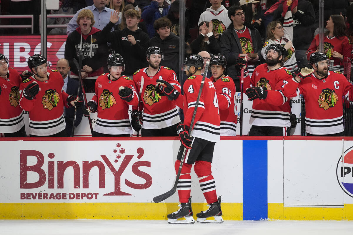 Chicago Blackhawks defenseman Seth Jones (4) celebrates after scoring against Vegas Golden Knig ...