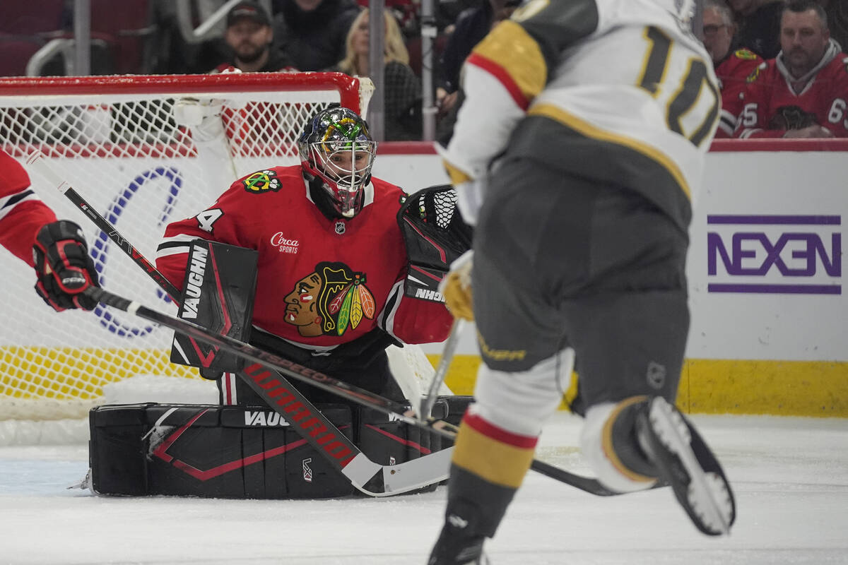 Chicago Blackhawks goaltender Petr Mrazek (34) blocks a shot from Vegas Golden Knights center N ...