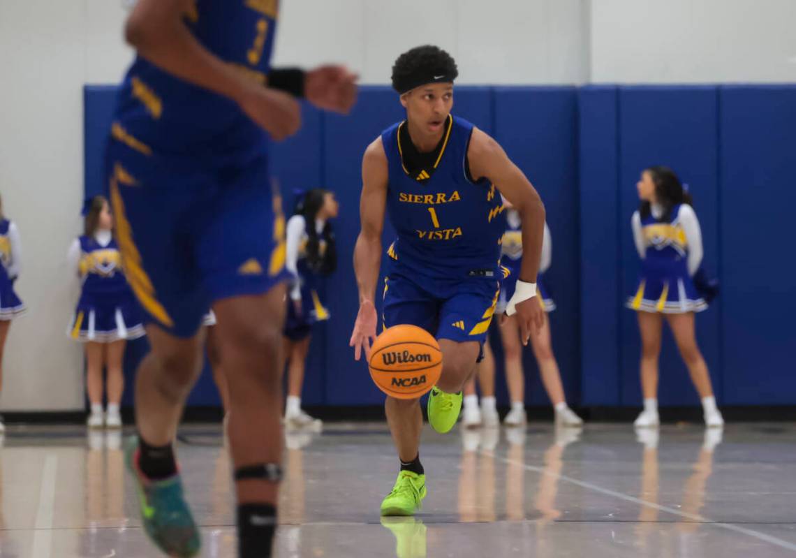 Sierra Vista guard Jevon Yapi (1) brings the ball up court during a basketball game at Basic Ac ...