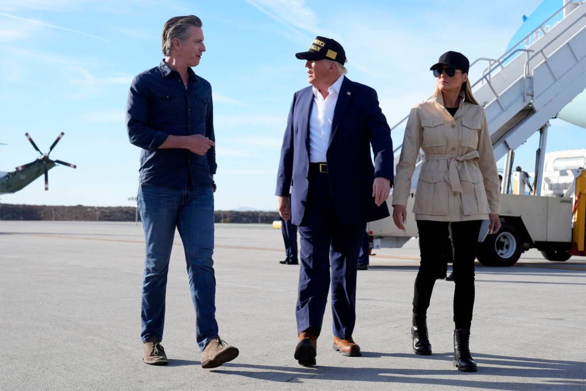 President Donald Trump and first lady Melania Trump walk with California Gov. Gavin Newsom afte ...