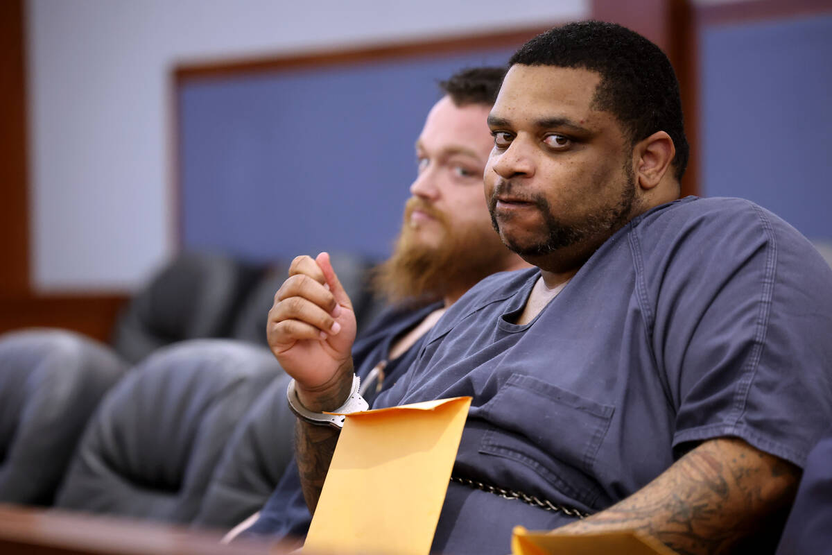 Clarence Martin Jr., right, appears in court for sentencing at the Regional Justice Center in L ...