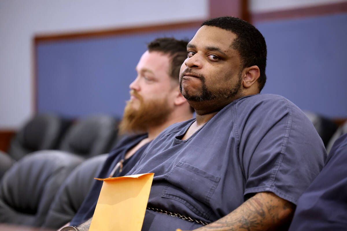 Clarence Martin Jr., right, appears in court for sentencing at the Regional Justice Center in L ...