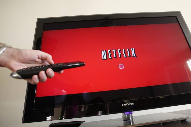 In this Associated Press file photo, a Netflix customer uses Netflix in Palo Alto, Calif. (AP P ...