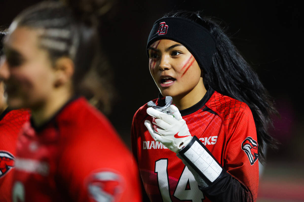 Desert Oasis wide receiver Allie Peralta (14) heads back to the sidelines after a team touchdow ...