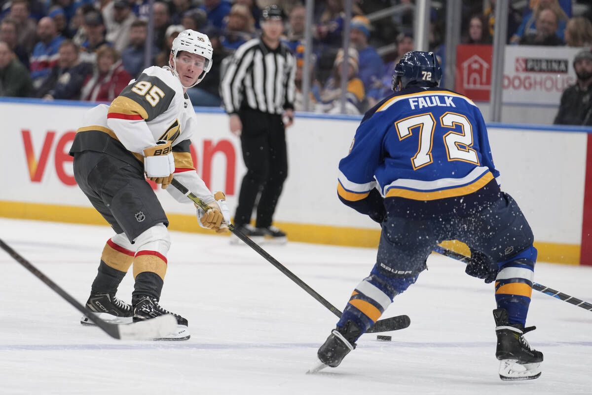 Vegas Golden Knights' Victor Olofsson (95) looks to pass as St. Louis Blues' Justin Faulk (72) ...