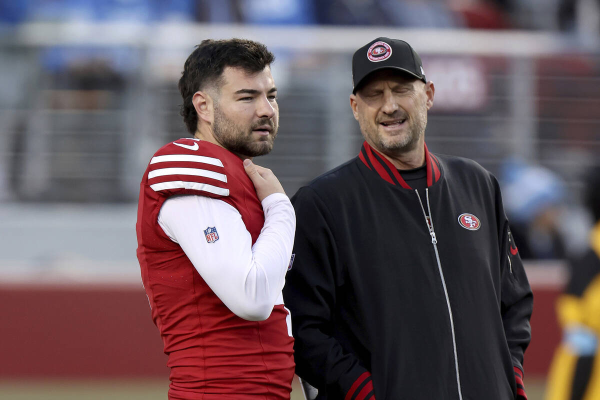 San Francisco 49ers Special Teams Coordinator Brian Schneider speaks with place kicker Jake Moo ...