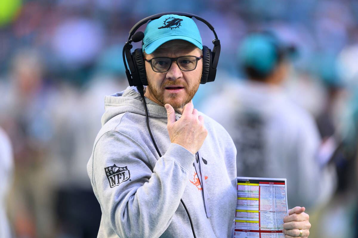 Miami Dolphins quarterbacks/pass game coordinator Darrell Bevell stands on the sidelines during ...