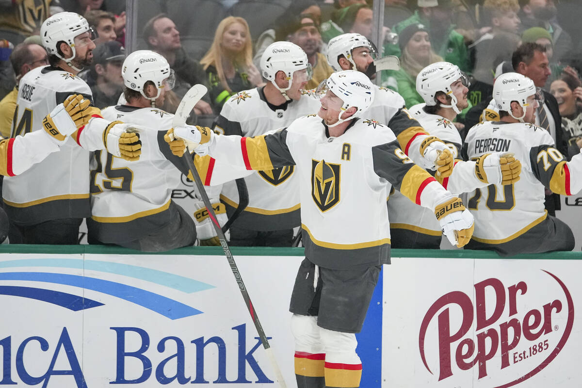 Vegas Golden Knights center Jack Eichel skates by his team's bench after scoring a goal against ...
