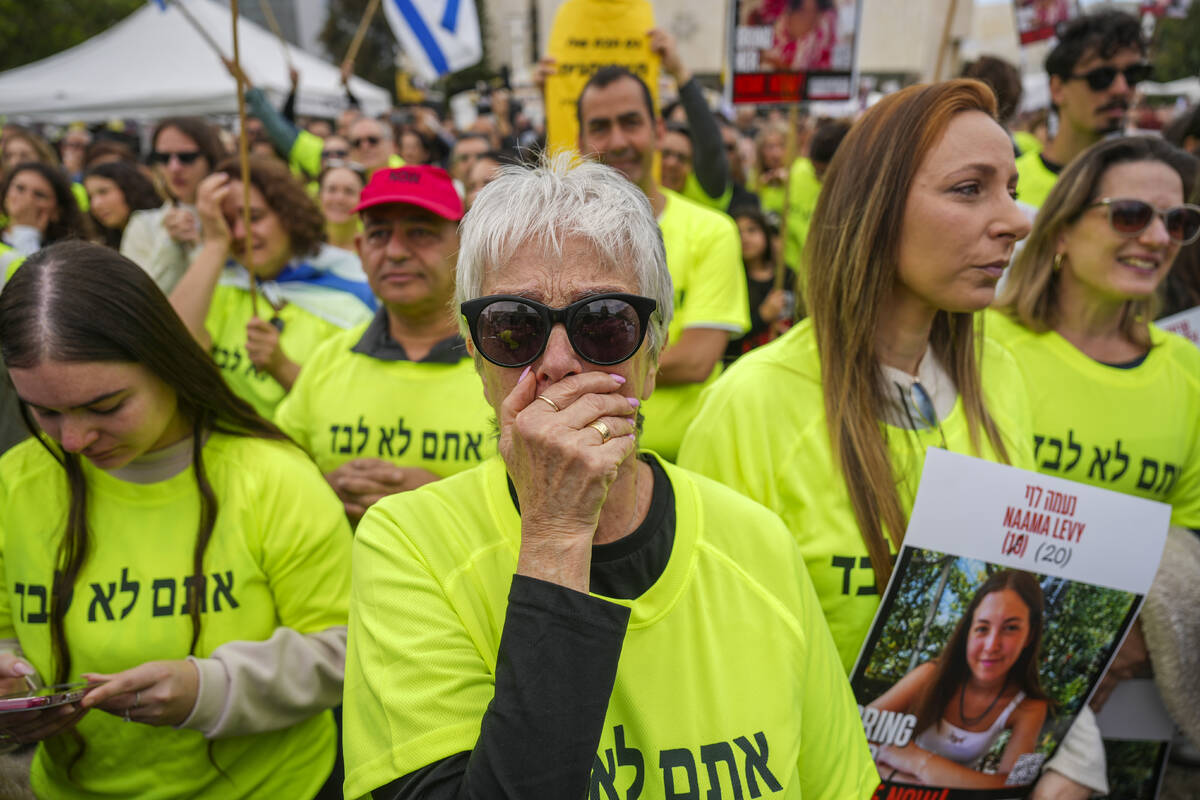 Relatives and friends of Israeli people killed and abducted by Hamas and taken into Gaza follow ...