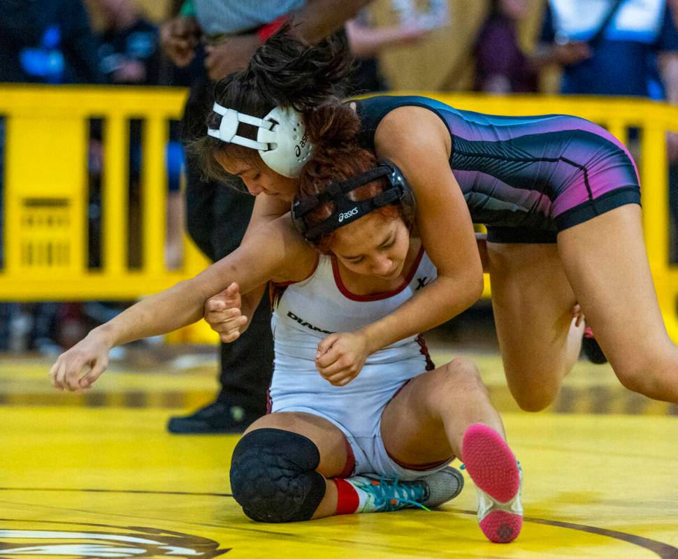 SLAM Academy’s Bertha Cabrera dominates Desert Oasis' Hazel Garcia during their 105 poun ...