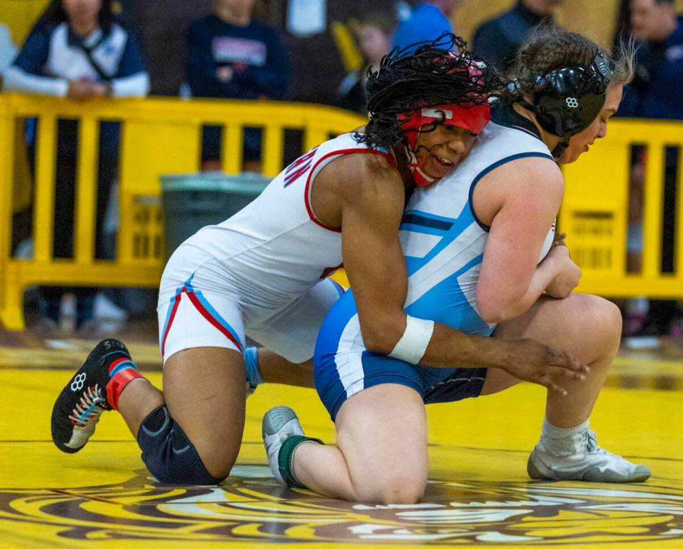 Western’s I’yanna Jones catches Centennial’s Madison Worden from behind du ...