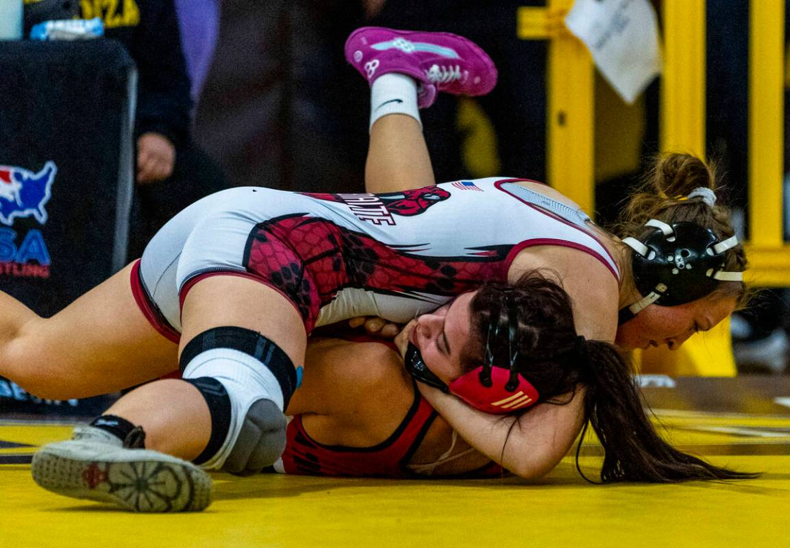 Desert Oasis’ Evelina Juzenaite works to pin Liberty’s Yulliana Quiroga during th ...