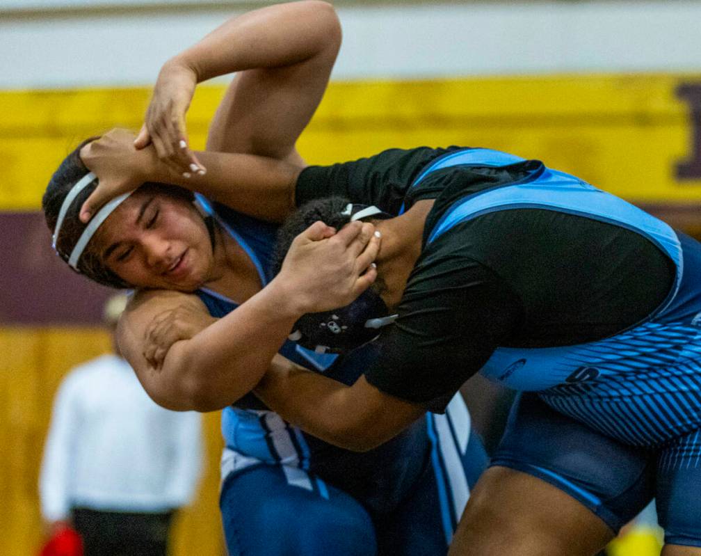 Centennial’s Kitana Leafaatoto Canyon Springs’ Isabella Gray during their 235 po ...