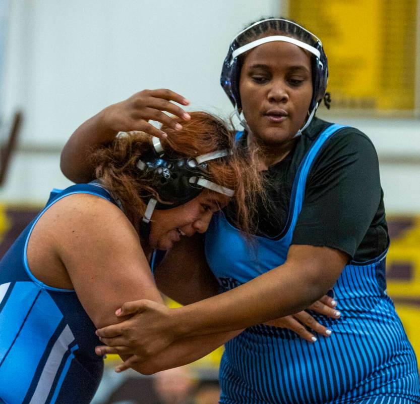 Centennial’s Kitana Leafaatoto grapples with Canyon Springs’ Isabella Gray during ...