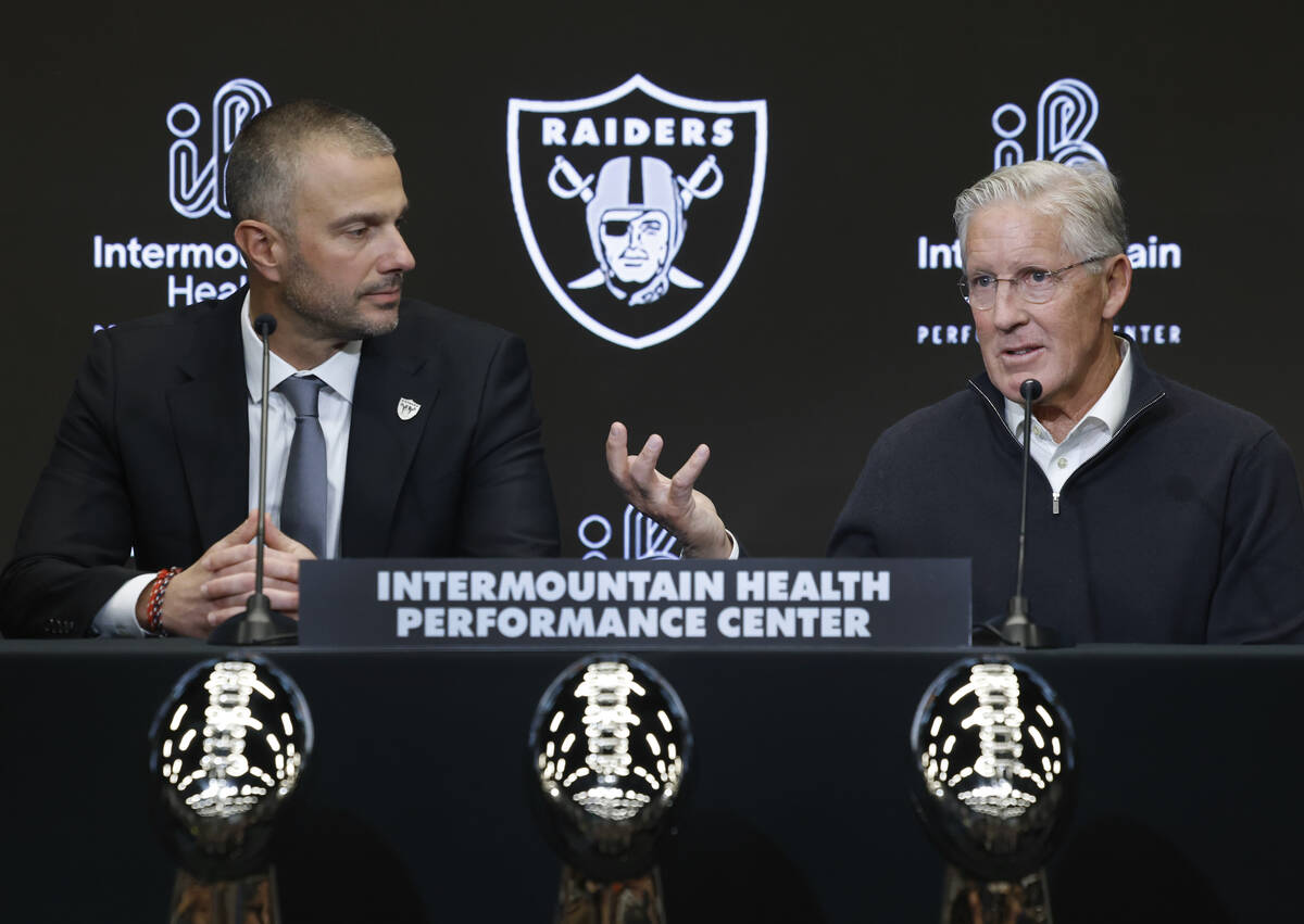 The new Raiders head coach Pete Carroll speaks as new general manager John Spytek looks on duri ...