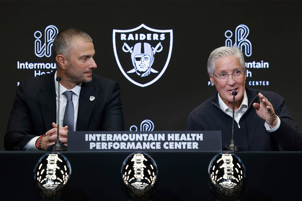 The new Raiders head coach Pete Carroll speaks as new general manager John Spytek looks on duri ...