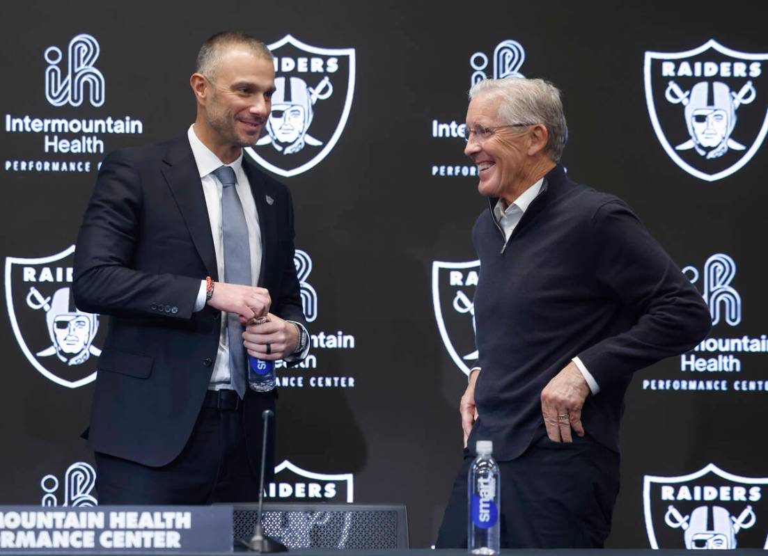 The new Raiders general manager John Spytek, left, and new head coach Pete Carroll share laught ...