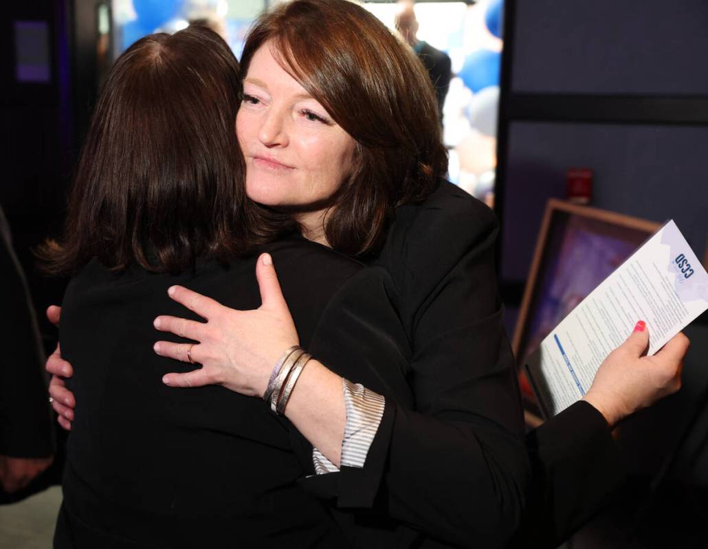 Clark County School District Interim Superintendent Dr. Brenda Larsen-Mitchell hugs a supporter ...