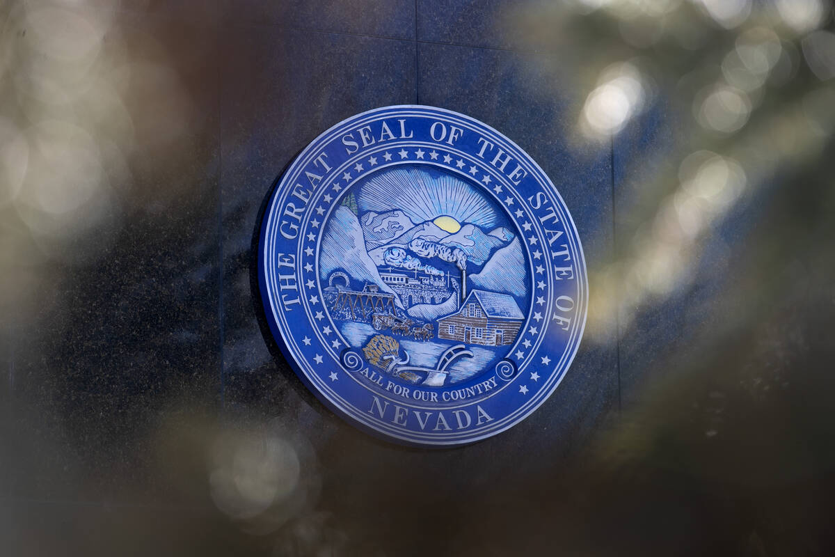 FILE - The Great Seal of the State of Nevada adorns the Nevada Legislature building during the ...