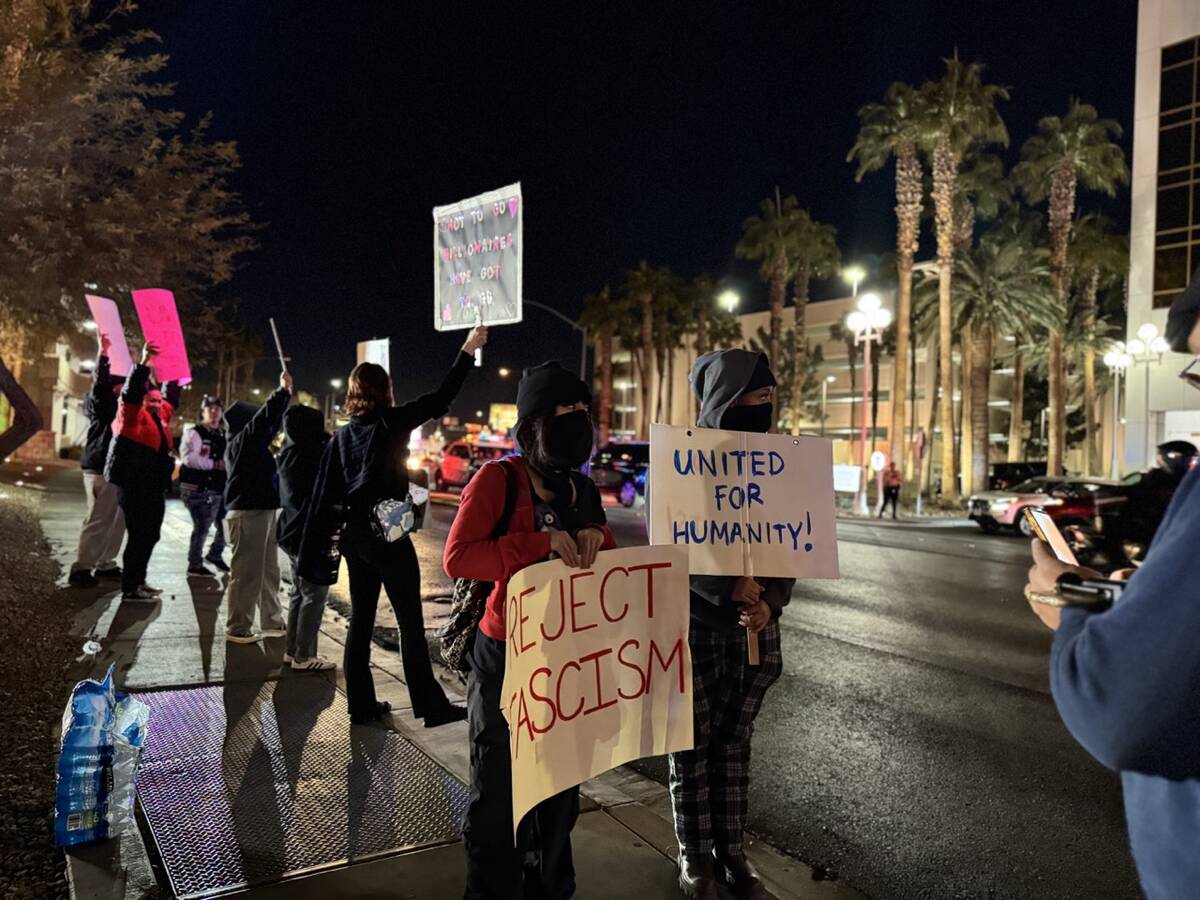 About 30 people gathered across the street from the Trump International hotel on Wednesday, Jan ...