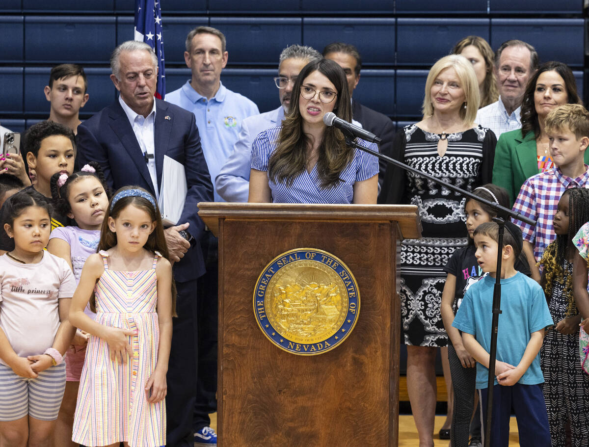 Valeria Gurr, Nevada School Choice Coalition, speaks during a "school choice" rally as Gov. Joe ...