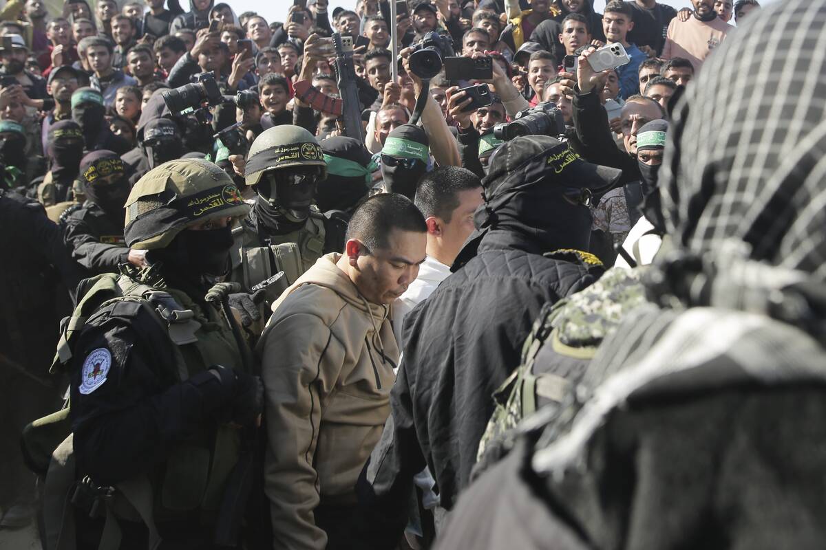 Two Thai captives, who has been held hostage by Hamas in Gaza since October 7, 2023, are escort ...