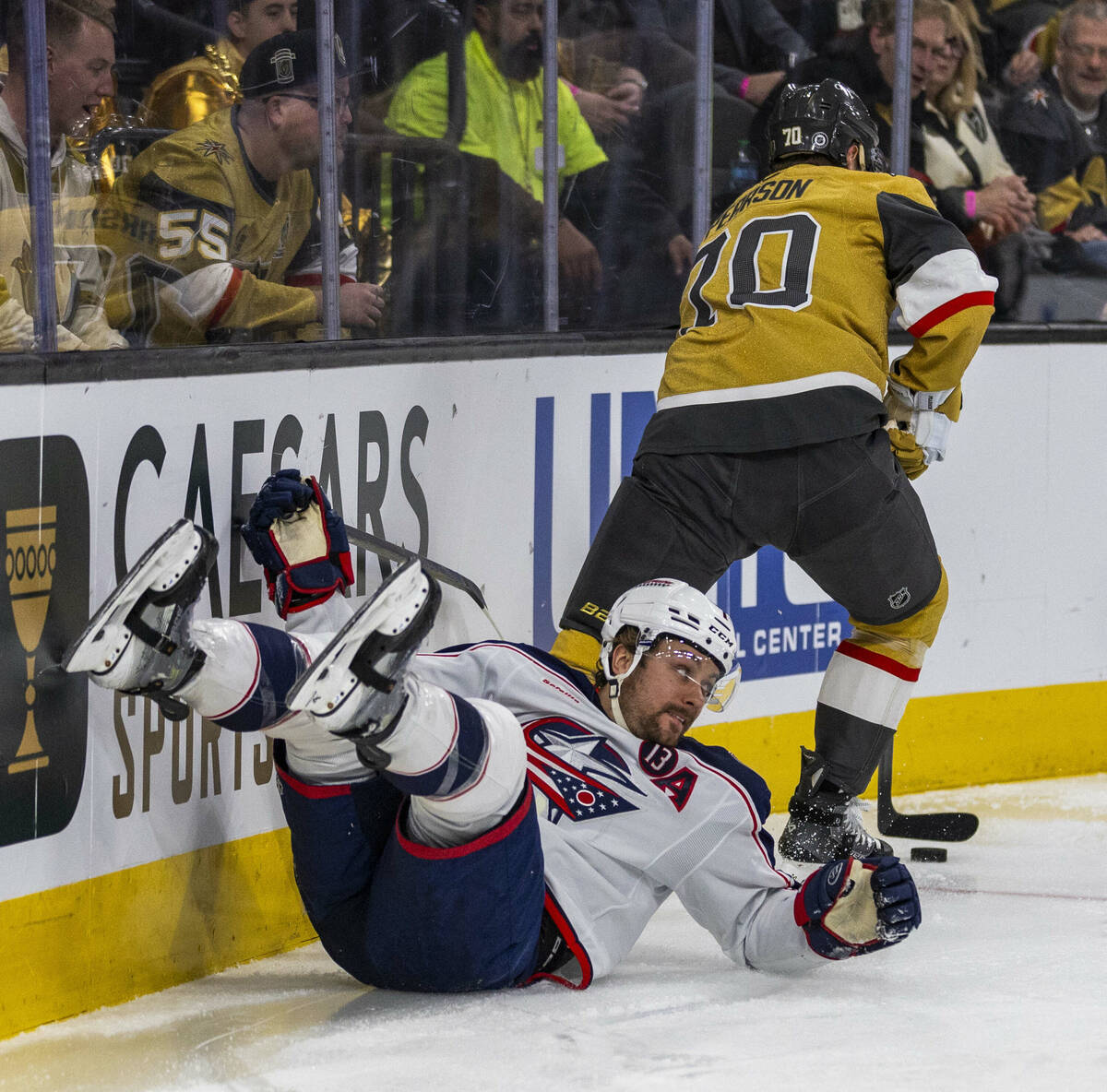 Columbus Blue Jackets center Sean Kuraly (7) is stripped and taken down by Golden Knights left ...