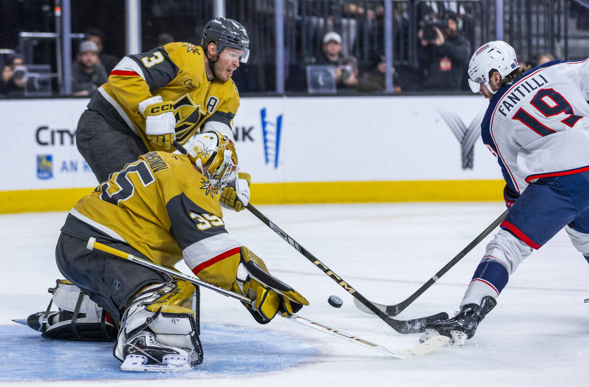 Golden Knights goaltender Ilya Samsonov (35) looks to stop a shot attempt by Columbus Blue Jack ...