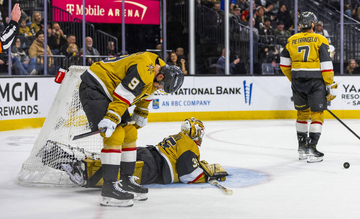 Golden Knights goaltender Ilya Samsonov (35) and center Jack Eichel (9) are dejected after he m ...