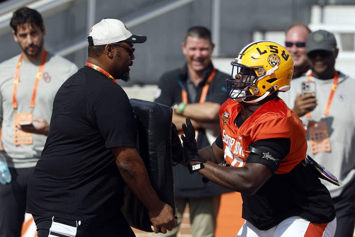 American team offensive lineman Emery Jones of LSU (50) runs through drills during practice for ...