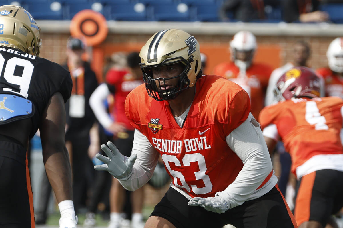 National team offensive lineman Marcus Mbow of Purdue (63) runs through drills during practice ...
