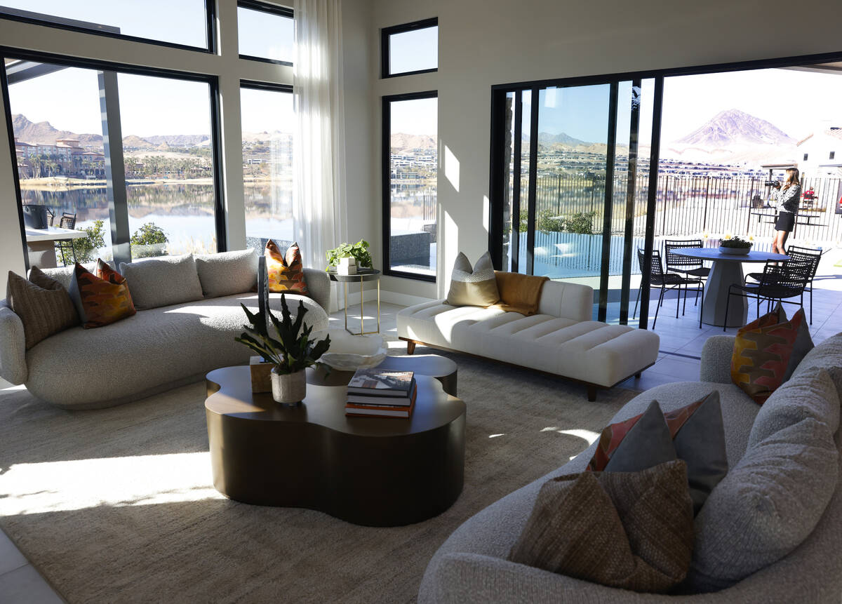 A living room is seen inside La Cova's two-story model home at South Shore Lake Las Vegas, on T ...