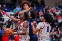 Coronado’s Jalen St. Clair (3) readies himself for a basket during a boys basketball gam ...