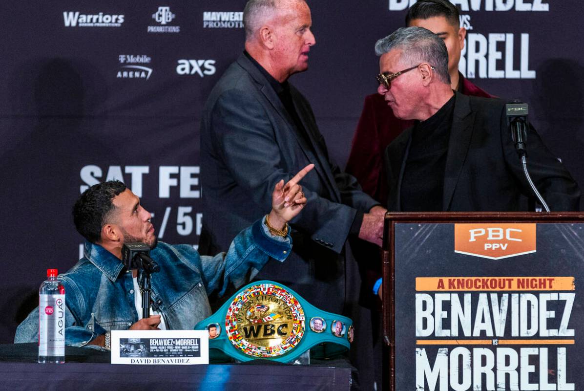 Interim WBC light heavyweight champion David “El Monstro” Benavídez argues with manager Lu ...