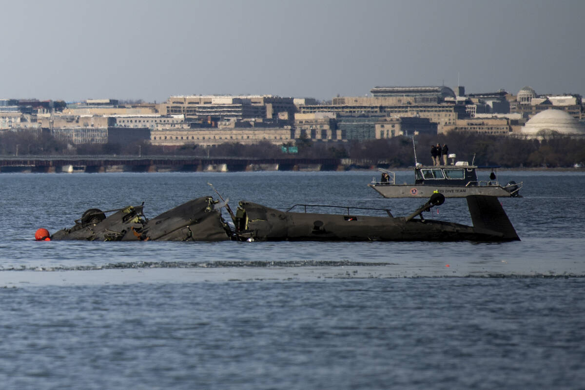 In this image provided by the U.S. Coast Guard, wreckage is seen in the Potomac River near Rona ...