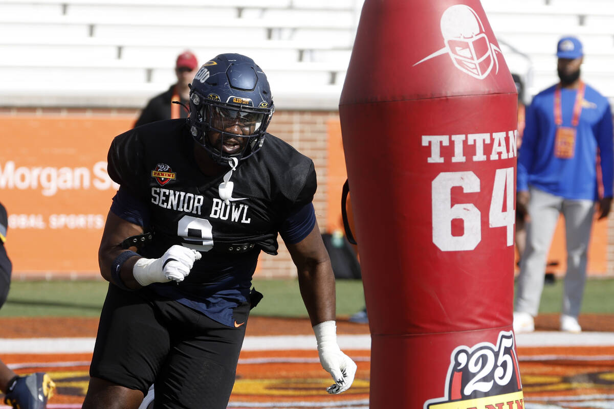 National team defensive lineman Darius Alexander of Toledo (9) runs through drills during pract ...