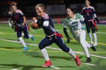 Coronado's Bailey Goldberg (1) runs the ball under pressure from Green Valley's Destany Jauregu ...