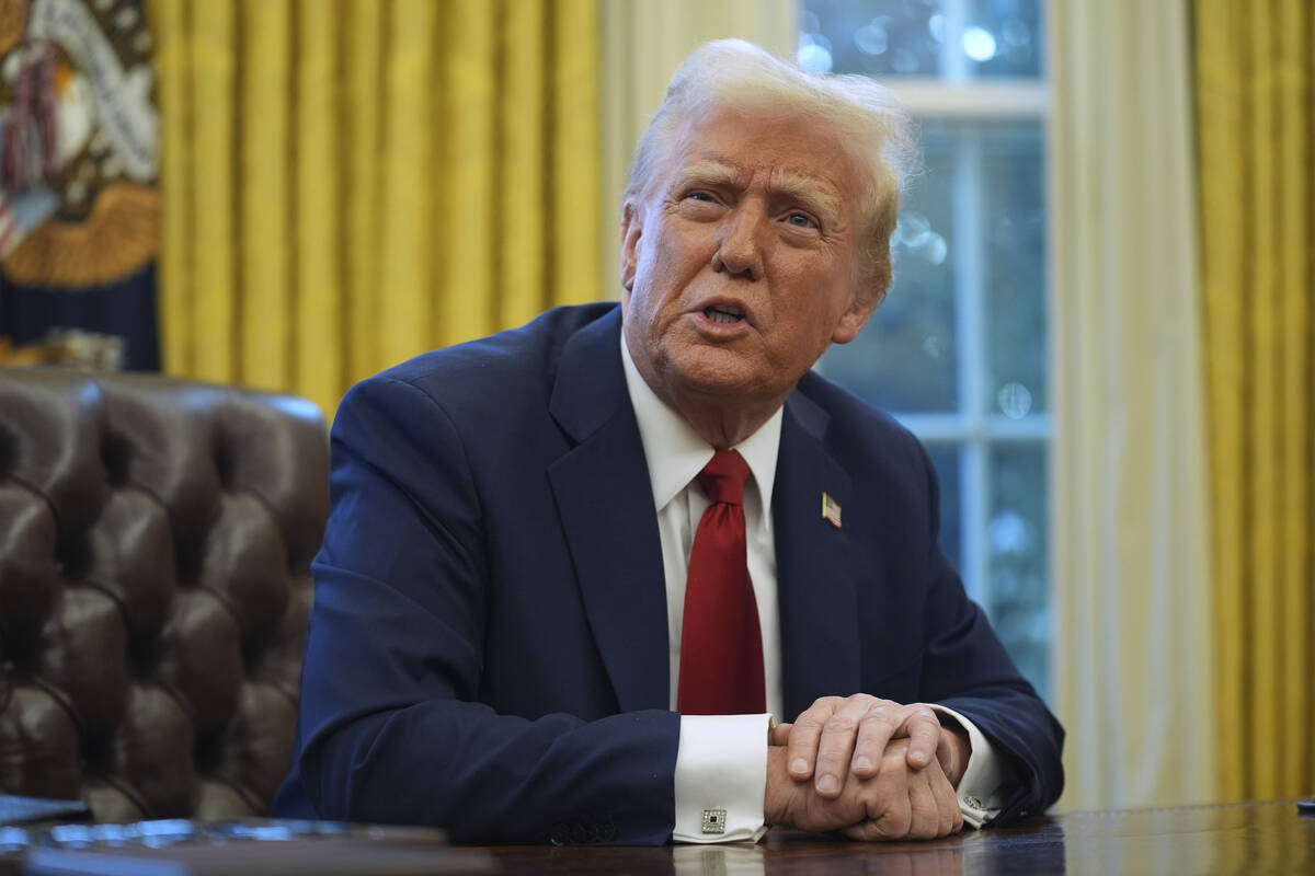 President Donald Trump speaks as he signs executive orders in the Oval Office at the White Hous ...