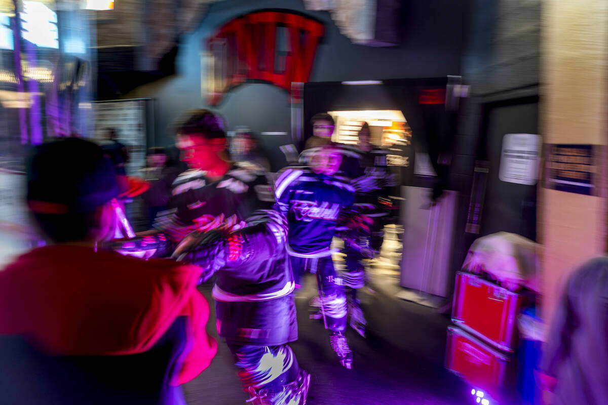 UNLV players leave their locker room for the ice before the club hockey team faces the Jamestow ...