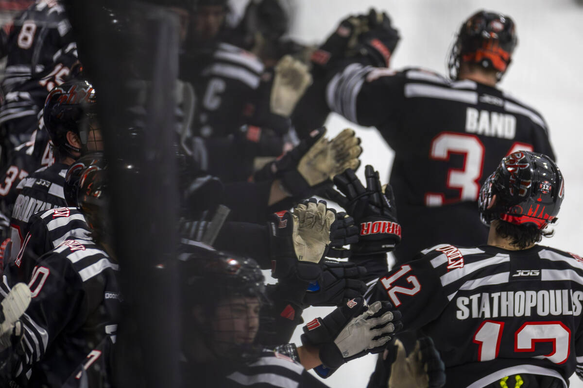 UNLV players celebrate a goal with their bench against Jamestown Jimmies players during the sec ...