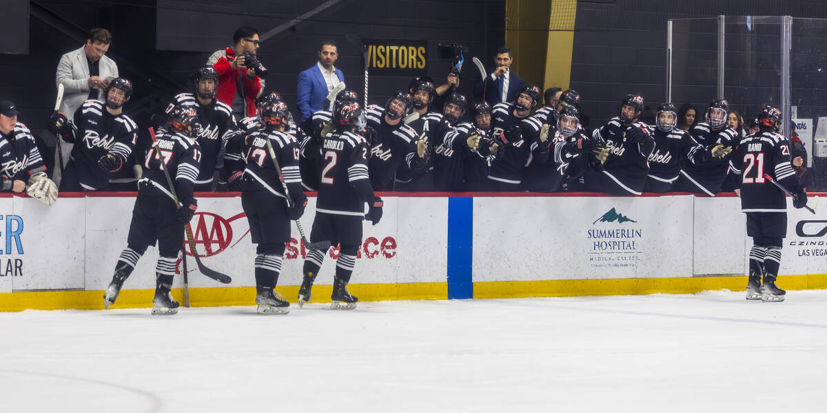 UNLV players celebrate a goal with their bench against Jamestown Jimmies players during the sec ...