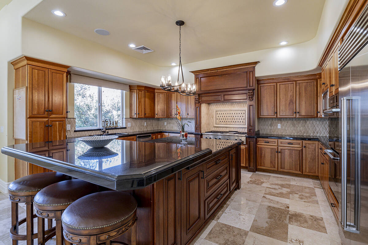 Residents will enjoy a chef’s kitchen with a Sub-Zero fridge, Thermador stove, double oven, t ...