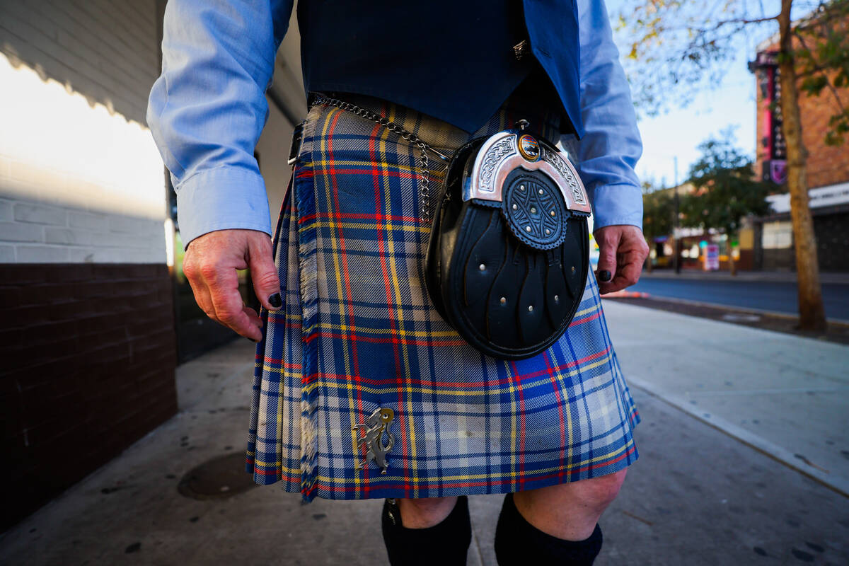 Local bagpiper Andrew Fusco, whose kilt is the Nevada tartan, stands for a portrait in the East ...