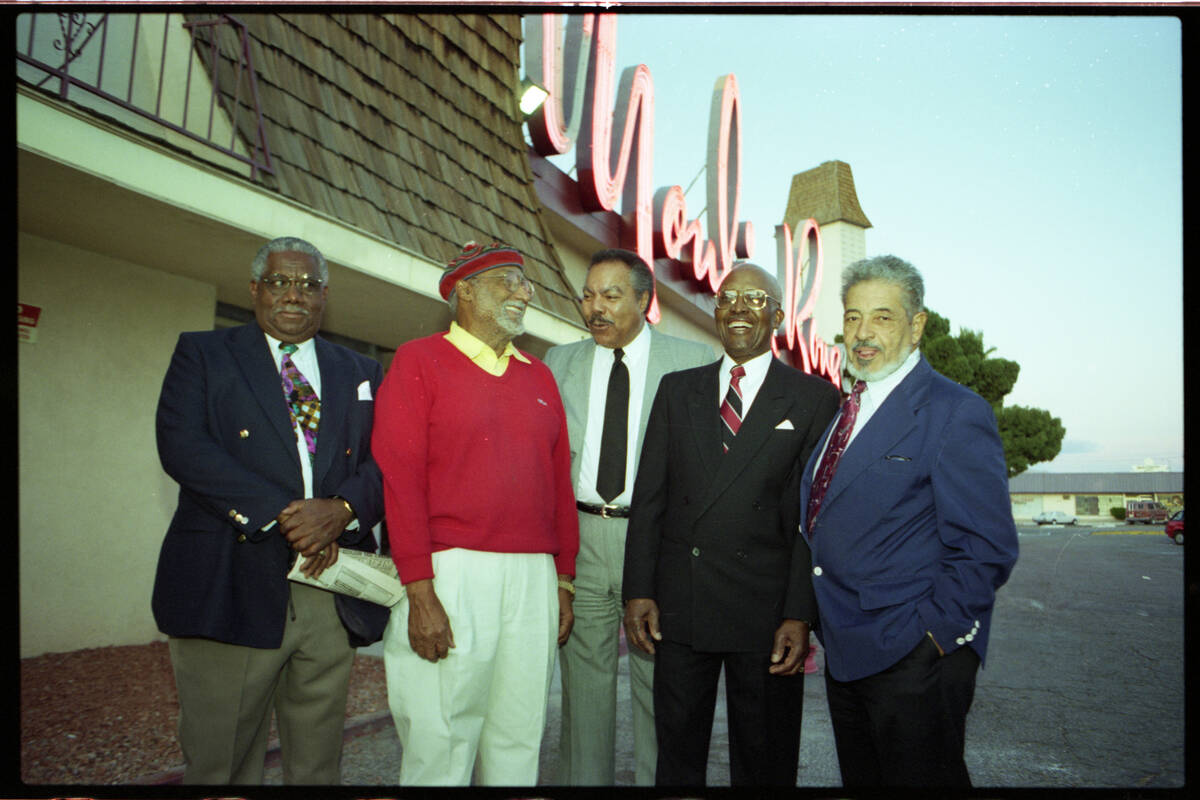 Woodrow Wilson met with others on March 26, 1960, at the Moulin Rouge to sign an agreement with ...