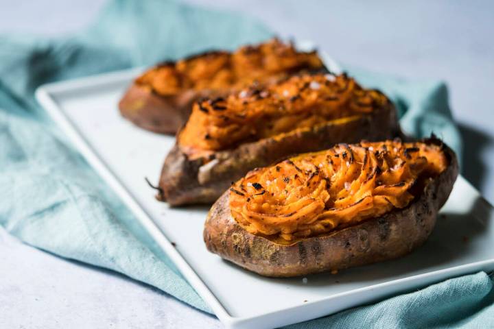 A plate of twice-baked stuffed sweet potatoes appears in Leesburg, Va., on Oct. 13, 2018. (Carl ...